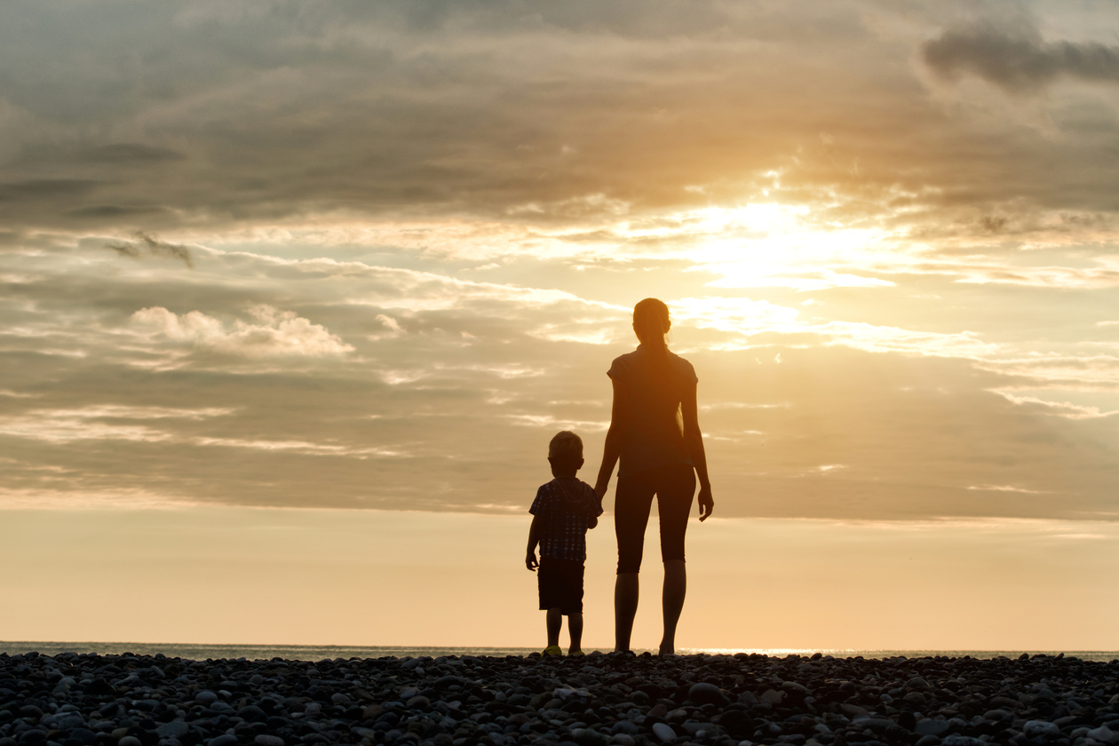 Mom and Son Are Standing 